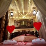 Pack amoureux (décoration pétales de roses, chocolats, bouteille de champagne 75cl)