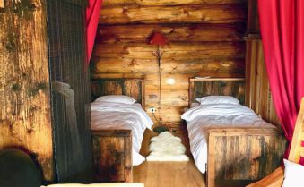 Nuit dans une cabane de rondins "La Thuile" image 1